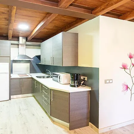 Apartamentos El Capricho Country house