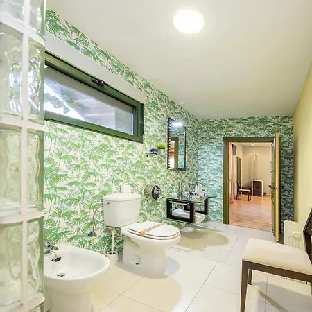 Apartamentos El Capricho Country house