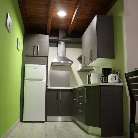 Apartamentos El Capricho Country house